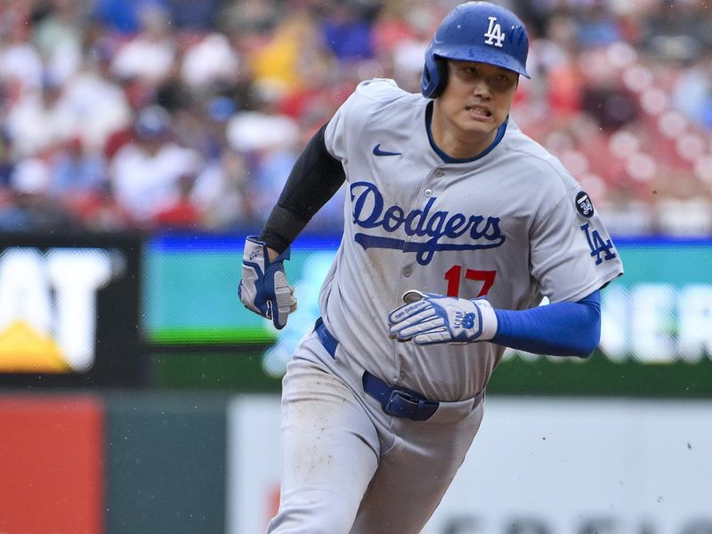 Jun 7, 2025; St. Louis, Missouri, USA;  Los Angeles Dodgers designated hitter Shohei Ohtani (17) runs to third against the St. Louis Cardinals during the ninth inning at Busch Stadium. Mandatory Credit: Jeff Curry-Imagn Images