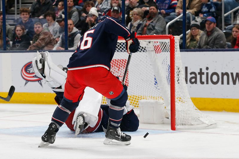 Jan 2, 2024; Columbus, Ohio, USA; Columbus Blue Jackets goalie Spencer Martin (30) makes a save against the Boston Bruins during the second period at Nationwide Arena. Mandatory Credit: Russell LaBounty-USA TODAY Sports