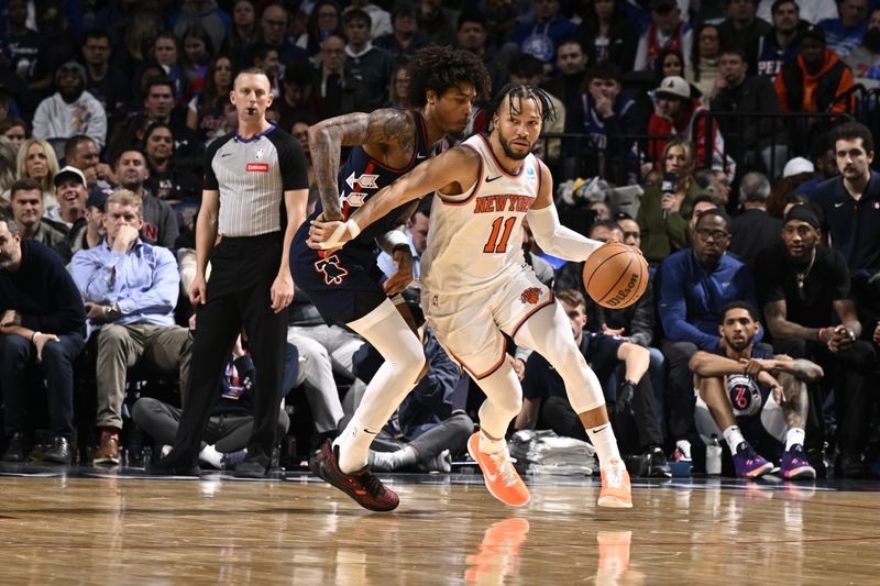 PHILADELPHIA, PA - FEBRUARY 22: Jalen Brunson #11 of the New York Knicks dribbles the ball during the game against the Philadelphia 76ers on February 22, 2024 at the Wells Fargo Center in Philadelphia, Pennsylvania NOTE TO USER: User expressly acknowledges and agrees that, by downloading and/or using this Photograph, user is consenting to the terms and conditions of the Getty Images License Agreement. Mandatory Copyright Notice: Copyright 2024 NBAE (Photo by David Dow/NBAE via Getty Images)