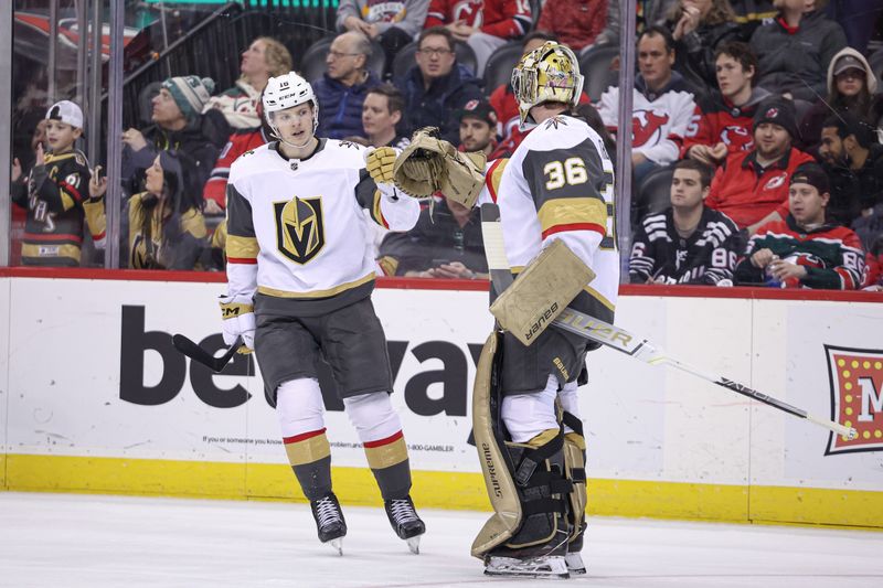 Jan 22, 2024; Newark, New Jersey, USA; Vegas Golden Knights left wing Pavel Dorofeyev (16) celebrates with goaltender Logan Thompson (36) after his goal against the New Jersey Devils during the first period at Prudential Center. Mandatory Credit: Vincent Carchietta-USA TODAY Sports