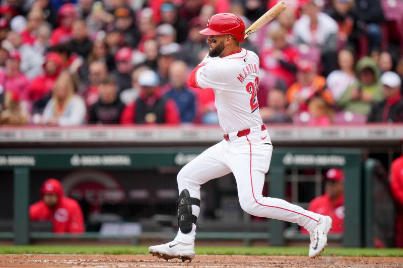 April 21, 2024; Cincinnati, Ohio, USA;Cincinnati Reds designated hitter Nick Martini (23) reaches base on an error by Los Angeles Angels second base Luis Rengifo (2) (not pictured) in the sixth inning at Great American Ball Park. Mandatory Credit: Kareem Elgazzar/USA TODAY Sports via The Cincinnati Enquirer

