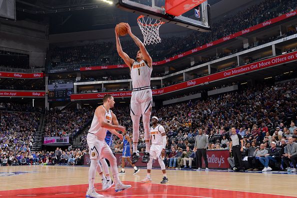 SACRAMENTO, CA - DECEMBER 2: Michael Porter Jr. #1 of the Denver Nuggets grabs the rebound during the game against the Sacramento Kings on December 2, 2023 at Golden 1 Center in Sacramento, California. NOTE TO USER: User expressly acknowledges and agrees that, by downloading and or using this Photograph, user is consenting to the terms and conditions of the Getty Images License Agreement. Mandatory Copyright Notice: Copyright 2023 NBAE (Photo by Rocky Widner/NBAE via Getty Images)