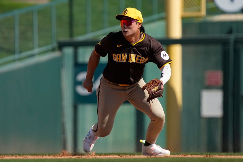 Feb 28, 2024; Phoenix, Arizona, USA; San Diego Padres shortstop Ha-Seong Kim (7) gets set against the Chicago White Sox in the first inning at Camelback Ranch-Glendale. Mandatory Credit: Rick Scuteri-USA TODAY Sports