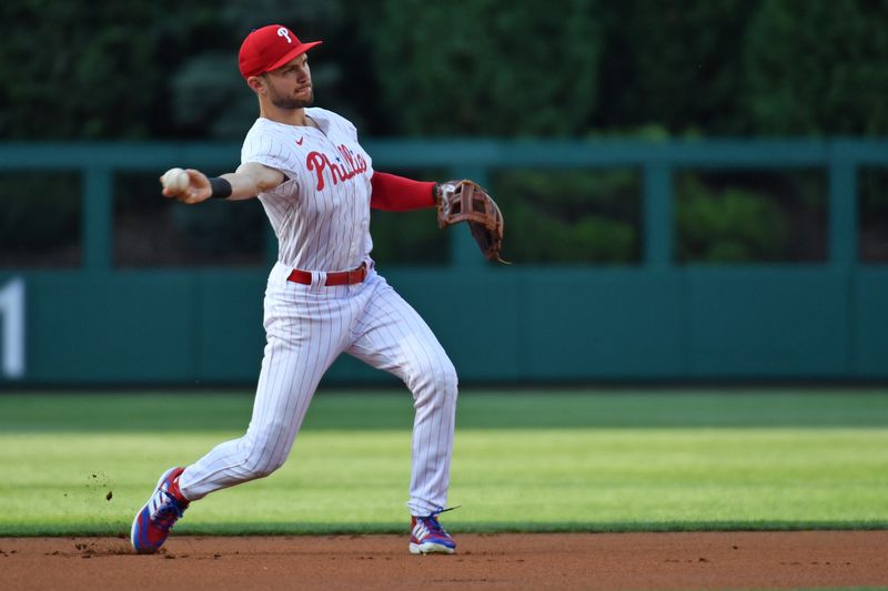 Jun 17, 2024; Philadelphia, Pennsylvania, USA; Philadelphia Phillies shortstop Trea Turner (7) throws to first base during the first inning against the San Diego Padres at Citizens Bank Park. Mandatory Credit: Eric Hartline-USA TODAY Sports