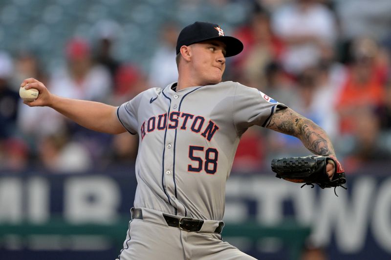 Jun 8, 2024; Anaheim, California, USA;  Houston Astros starting pitcher Hunter Brown (58) delivers to the plate in the first inning against the Los Angeles Angels at Angel Stadium. Mandatory Credit: Jayne Kamin-Oncea-USA TODAY Sports