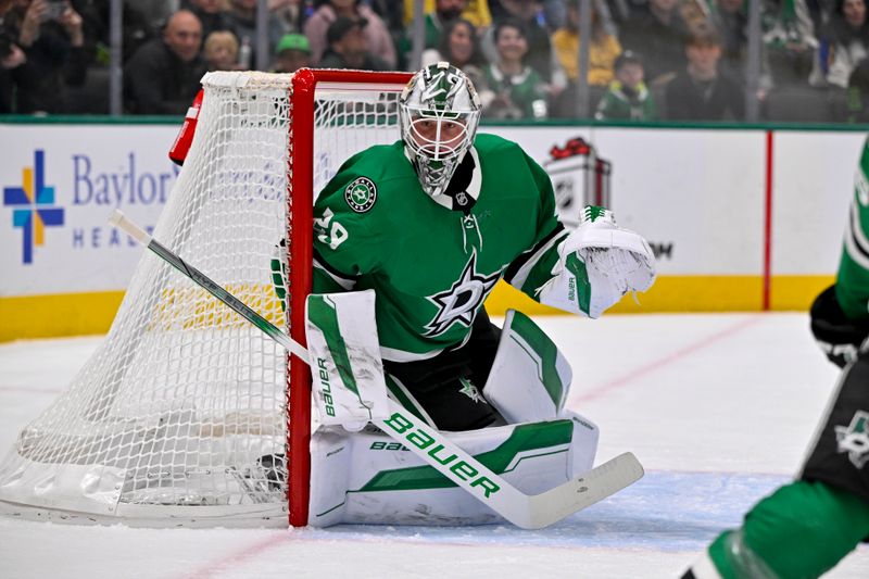 Dec 14, 2024; Dallas, Texas, USA; Dallas Stars goaltender Jake Oettinger (29) faces the St. Louis Blues attack during the first period at American Airlines Center. Mandatory Credit: Jerome Miron-Imagn Images