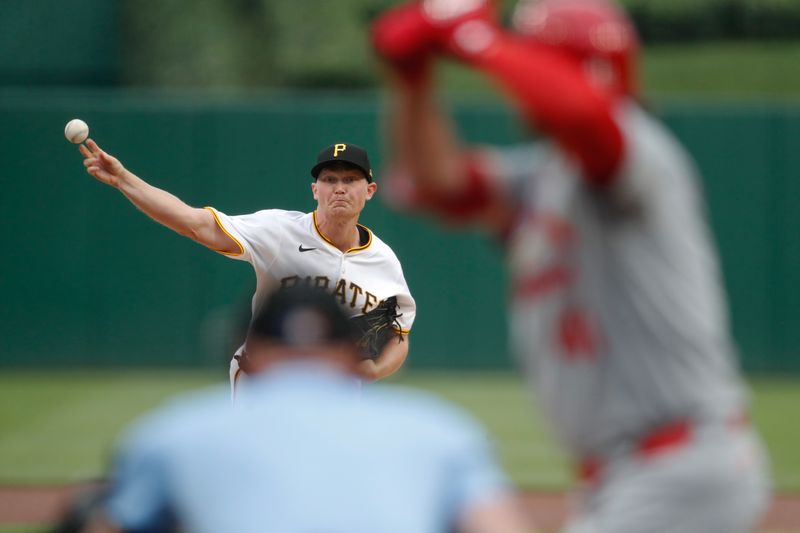 Jul 22, 2024; Pittsburgh, Pennsylvania, USA;  Pittsburgh Pirates starting pitcher Mitch Keller (23) delivers a pitch against St. Louis Cardinals right fielder Alec Burleson (41) during the first inning at PNC Park. Mandatory Credit: Charles LeClaire-USA TODAY Sports