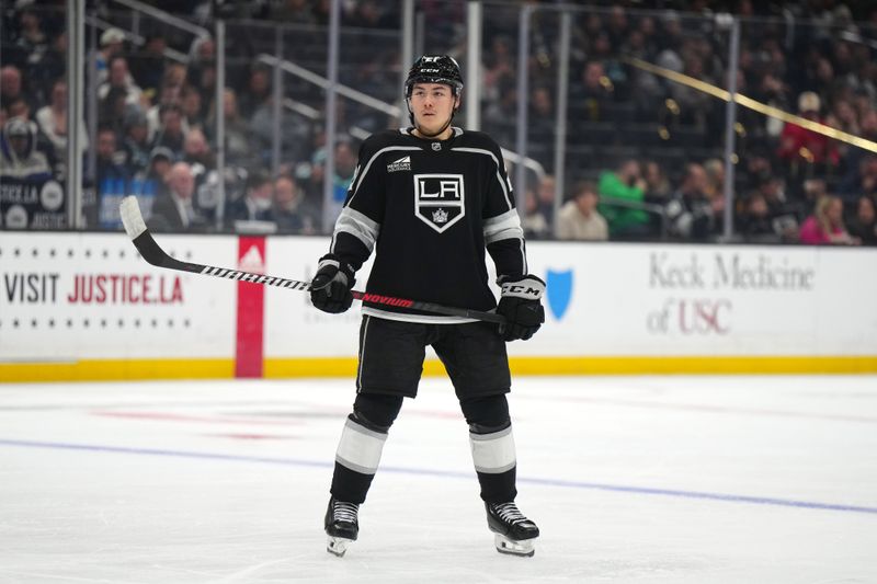 Dec 20, 2023; Los Angeles, California, USA; LA Kings defenseman Jordan Spence (21) against the Seattle Kraken in the second period at Crypto.com Arena. Mandatory Credit: Kirby Lee-USA TODAY Sports