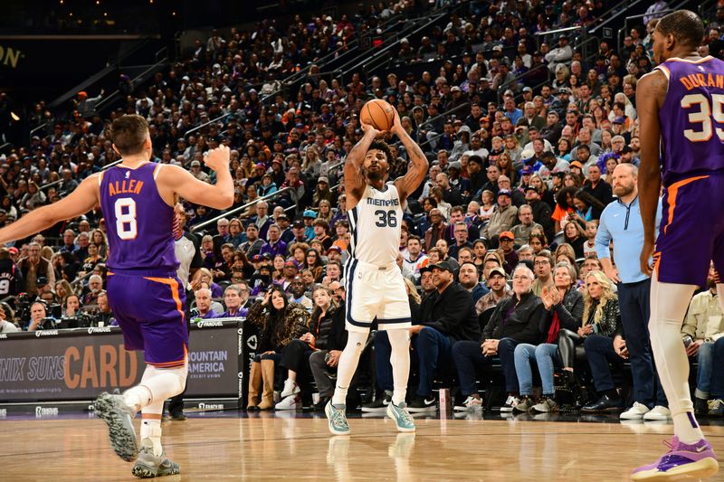 PHOENIX, AZ - JANUARY  7: Marcus Smart #36 of the Memphis Grizzlies shoots a three point basket during the game against the Phoenix Suns on January 7, 2024 at Footprint Center in Phoenix, Arizona. NOTE TO USER: User expressly acknowledges and agrees that, by downloading and or using this photograph, user is consenting to the terms and conditions of the Getty Images License Agreement. Mandatory Copyright Notice: Copyright 2024 NBAE (Photo by Kate Frese/NBAE via Getty Images)