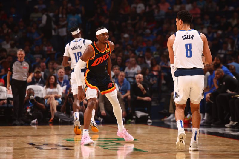 OKLAHOMA CITY, OK - APRIL 14:  Shai Gilgeous-Alexander #2 of the Oklahoma City Thunder plays defense during the game against the Dallas Mavericks on April 14, 2024 at Paycom Arena in Oklahoma City, Oklahoma. NOTE TO USER: User expressly acknowledges and agrees that, by downloading and or using this photograph, User is consenting to the terms and conditions of the Getty Images License Agreement. Mandatory Copyright Notice: Copyright 2024 NBAE (Photo by Zach Beeker/NBAE via Getty Images)