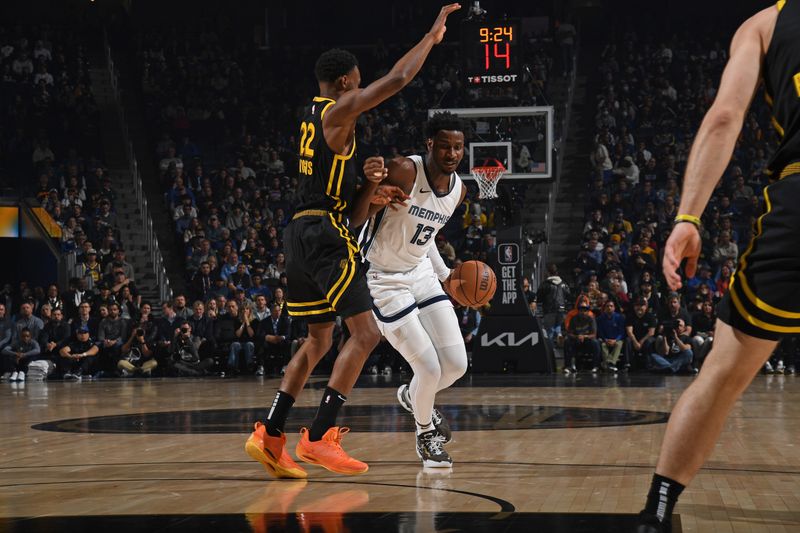 SAN FRANCISCO, CA - MARCH 20: Jaren Jackson Jr. #13 of the Memphis Grizzlies dribbles the ball during the game against the Golden State Warriors on March 20, 2024 at Chase Center in San Francisco, California. NOTE TO USER: User expressly acknowledges and agrees that, by downloading and or using this photograph, user is consenting to the terms and conditions of Getty Images License Agreement. Mandatory Copyright Notice: Copyright 2024 NBAE (Photo by Noah Graham/NBAE via Getty Images)