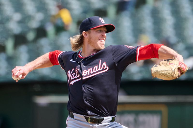 Apr 14, 2024; Oakland, California, USA; Washington Nationals pitcher Jordan Weems (51) throws a pitch against the Oakland Athletics during the sixth inning at Oakland-Alameda County Coliseum. Mandatory Credit: Robert Edwards-USA TODAY Sports