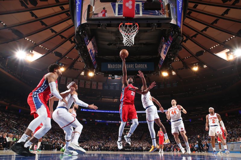 NEW YORK, NY - APRIL 20:  Joel Embiid #21 of the Philadelphia 76ers goes to the basket during the game against the New York Knicks during Round 1 Game 1 of the 2024 NBA Playoffs on April 20, 2024 at Madison Square Garden in New York City, New York.  NOTE TO USER: User expressly acknowledges and agrees that, by downloading and or using this photograph, User is consenting to the terms and conditions of the Getty Images License Agreement. Mandatory Copyright Notice: Copyright 2024 NBAE  (Photo by Nathaniel S. Butler/NBAE via Getty Images)