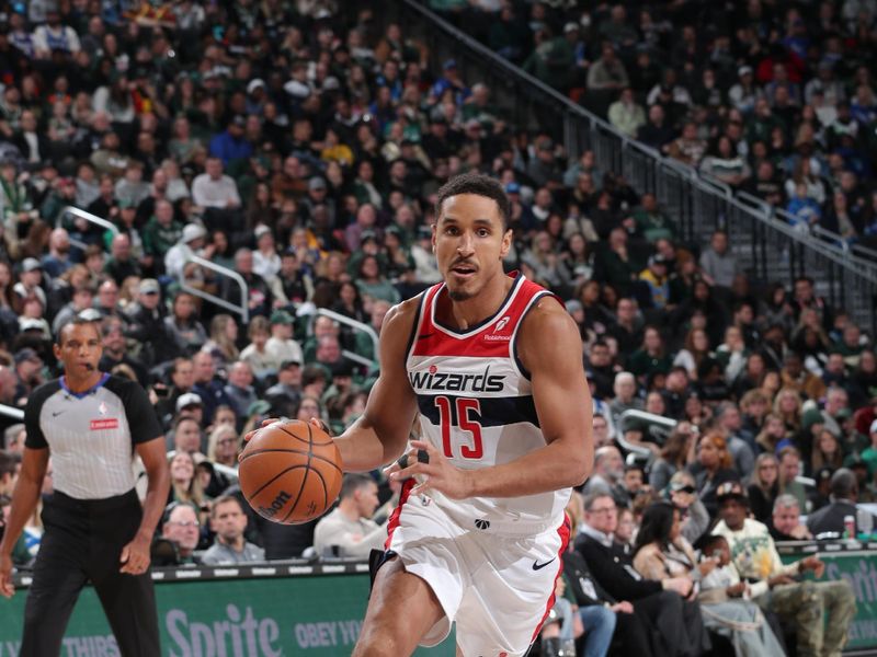 MILWAUKEE, WI - NOVEMBER 30: Malcolm Brogdon #15 of the Washington Wizards drives to the basket during the game against the Milwaukee Bucks on November 30, 2024 at Fiserv Forum Center in Milwaukee, Wisconsin. NOTE TO USER: User expressly acknowledges and agrees that, by downloading and or using this Photograph, user is consenting to the terms and conditions of the Getty Images License Agreement. Mandatory Copyright Notice: Copyright 2024 NBAE (Photo by Gary Dineen/NBAE via Getty Images).