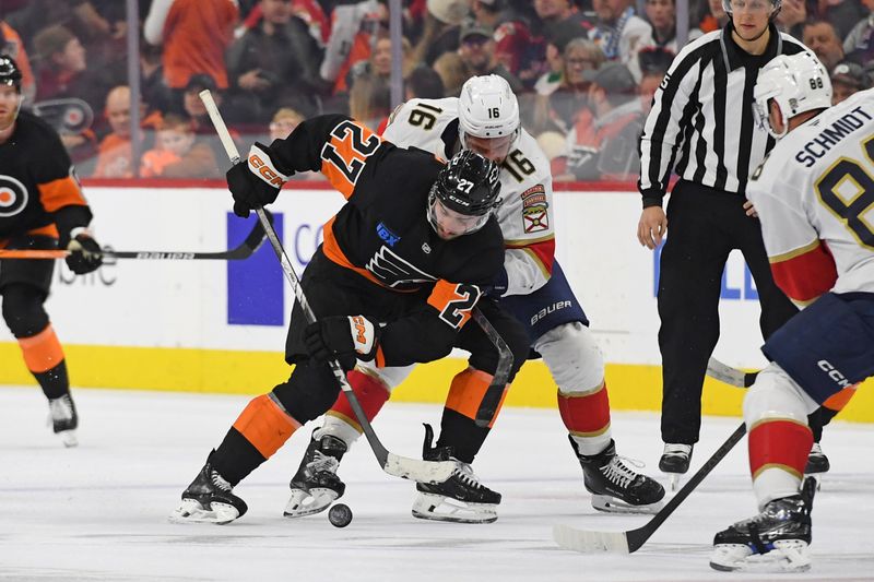 Jan 13, 2025; Philadelphia, Pennsylvania, USA; Philadelphia Flyers left wing Noah Cates (27) battle for the puck with Florida Panthers center Aleksander Barkov (16) during the third period at Wells Fargo Center. Mandatory Credit: Eric Hartline-Imagn Images