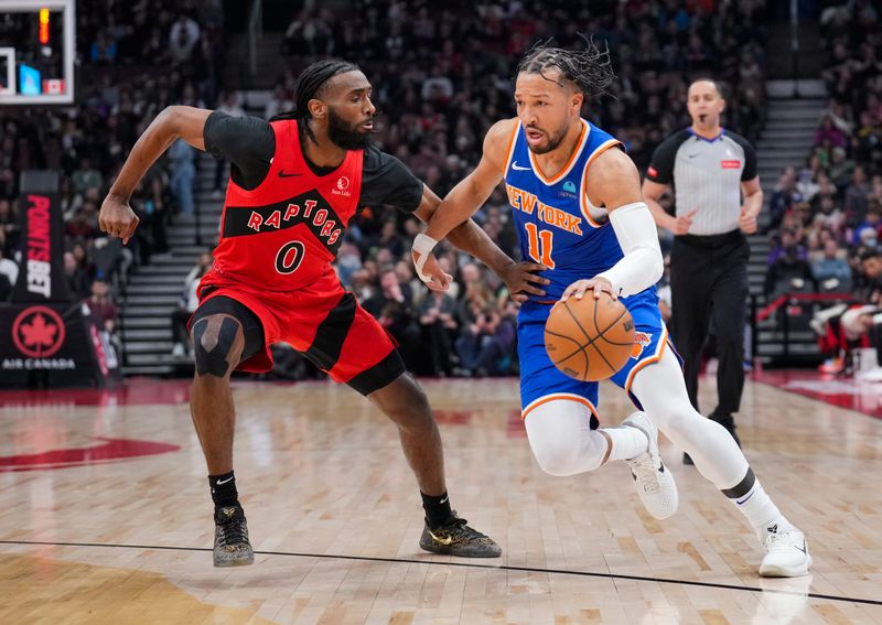 TORONTO, ON - MARCH 27: Jalen Brunson #11 of the New York Knicks dribbles against Javon Freeman-Liberty #0 of the Toronto Raptors during the first half of their basketball game at the Scotiabank Arena on March 27, 2024 in Toronto, Ontario, Canada. NOTE TO USER: User expressly acknowledges and agrees that, by downloading and/or using this Photograph, user is consenting to the terms and conditions of the Getty Images License Agreement. (Photo by Mark Blinch/Getty Images)