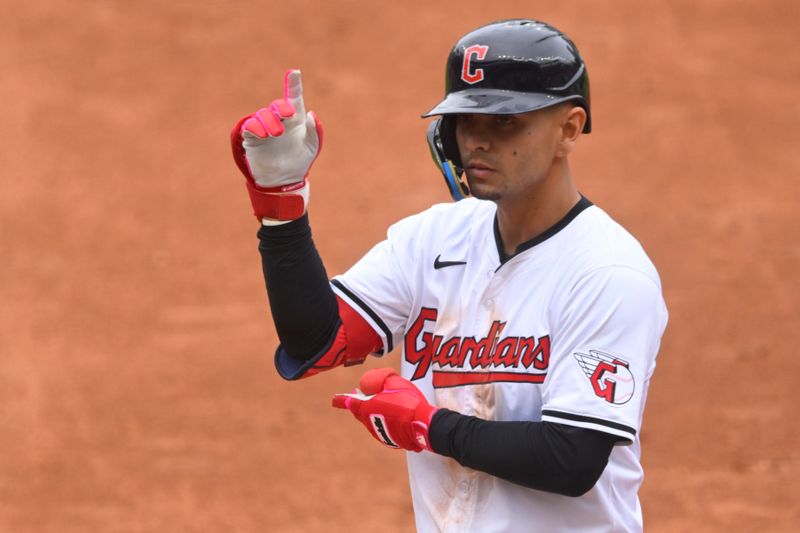 Jul 4, 2024; Cleveland, Ohio, USA; Cleveland Guardians second baseman Andres Gimenez (0) celebrates his single in the third inning against the Chicago White Sox at Progressive Field. Mandatory Credit: David Richard-USA TODAY Sports