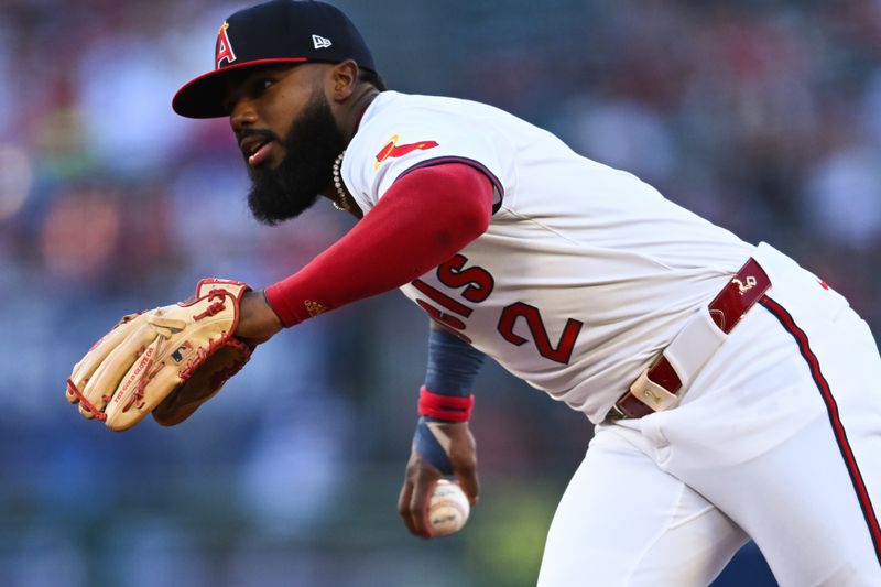 Jul 27, 2024; Anaheim, California, USA; Los Angeles Angels second baseman Luis Rengifo (2) fields a ball against the Oakland Athletics during the second inning at Angel Stadium. Mandatory Credit: Jonathan Hui-USA TODAY Sports