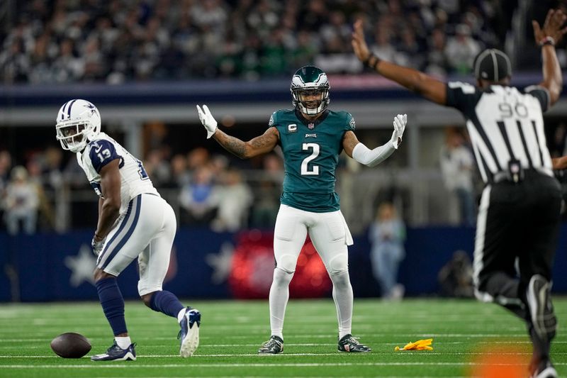 NFL side judge Anthony Flemming (90) throws a flag as Philadelphia Eagles cornerback Darius Slay (2) and Dallas Cowboys wide receiver Michael Gallup (13) look on during the first half of an NFL football game, Sunday, Dec. 10, 2023, in Arlington, Texas. (AP Photo/Sam Hodde)