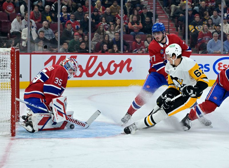 Oct 14, 2024; Montreal, Quebec, CAN; Montreal Canadiens goalie Sam Montembeault (35) stops a shot from Pittsburgh Penguins forward Rickard Rakell (67) during the first period at the Bell Centre. Mandatory Credit: Eric Bolte-Imagn Images