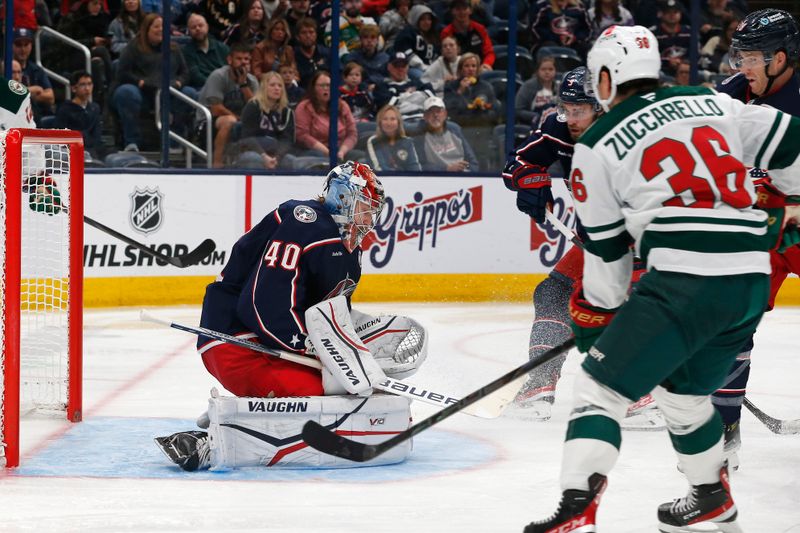 Oct 19, 2024; Columbus, Ohio, USA; Columbus Blue Jackets goalie Daniil Tarasov (40) makes a save against the Minnesota Wild during the third period  at Nationwide Arena. Mandatory Credit: Russell LaBounty-Imagn Images