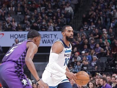 SACRAMENTO, CA - DECEMBER 23: Mike Conley #10 of the Minnesota Timberwolves dribbles the ball during the game against the Sacramento Kings on December 23, 2023 at Golden 1 Center in Sacramento, California. NOTE TO USER: User expressly acknowledges and agrees that, by downloading and or using this Photograph, user is consenting to the terms and conditions of the Getty Images License Agreement. Mandatory Copyright Notice: Copyright 2023 NBAE (Photo by Rocky Widner/NBAE via Getty Images)