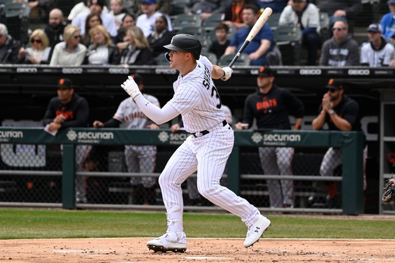 Apr 5, 2023; Chicago, Illinois, USA;  Chicago White Sox first baseman Gavin Sheets (32) hits an RBI single against the San Francisco Giants during the first inning at Guaranteed Rate Field. Mandatory Credit: Matt Marton-USA TODAY Sports