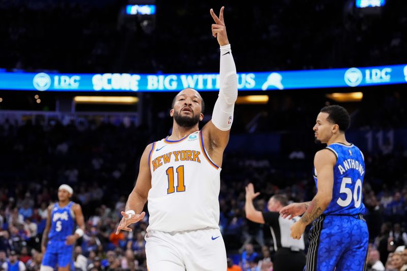 ORLANDO, FLORIDA - FEBRUARY 14: Jalen Brunson #11 of the New York Knicks celebrates scoring a three-pointer against the Orlando Magic during the first quarter at Kia Center on February 14, 2024 in Orlando, Florida. NOTE TO USER: User expressly acknowledges and agrees that, by downloading and or using this photograph, user is consenting to the terms and conditions of the Getty Images License Agreement. (Photo by Rich Storry/Getty Images)