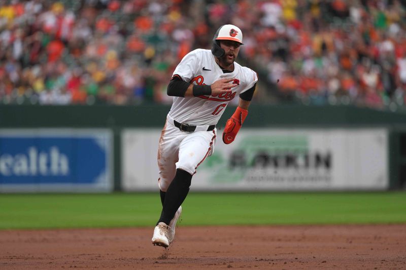 May 27, 2024; Baltimore, Maryland, USA; Baltimore Orioles outfielder Colton Cowser (17) rounds the bases to score in the second inning against the Boston Red Sox at Oriole Park at Camden Yards. Mandatory Credit: Mitch Stringer-USA TODAY Sports