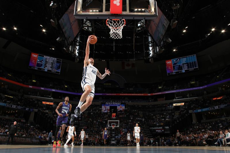 MEMPHIS, TN - MARCH 13: John Konchar #46 of the Memphis Grizzlies drives to the basket during the game against the Charlotte Hornets on March 13, 2024 at FedExForum in Memphis, Tennessee. NOTE TO USER: User expressly acknowledges and agrees that, by downloading and or using this photograph, User is consenting to the terms and conditions of the Getty Images License Agreement. Mandatory Copyright Notice: Copyright 2024 NBAE (Photo by Joe Murphy/NBAE via Getty Images)