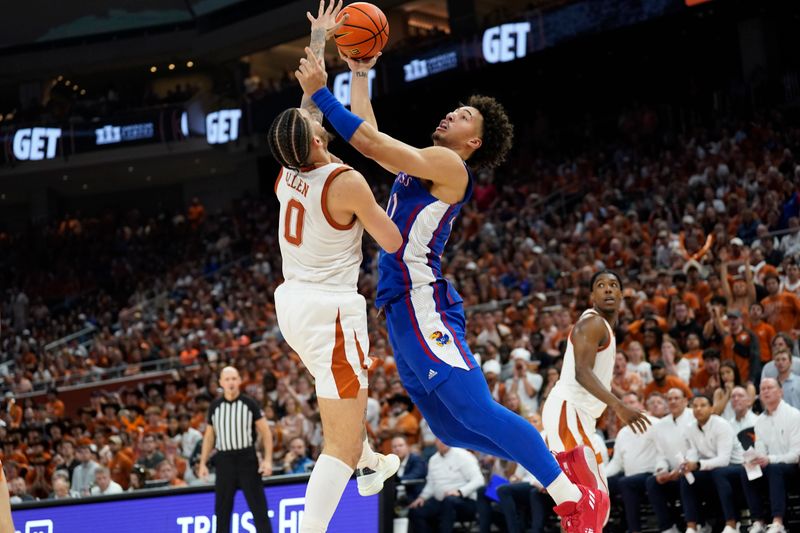 Mar 4, 2023; Austin, Texas, USA; Kansas Jayhawks forward Jalen Wilson (10) shoots over Texas Longhorns forward Timmy Allen (0) during the second half at Moody Center. Mandatory Credit: Scott Wachter-USA TODAY Sports