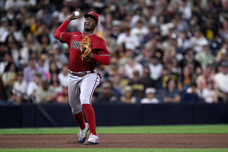 Aug 19, 2023; San Diego, California, USA; Arizona Diamondbacks third baseman Geraldo Perdomo (2) throws to first base on a ground out by San Diego Padres second baseman Ha-seong Kim (not pictured) during the sixth inning at Petco Park. Mandatory Credit: Orlando Ramirez-USA TODAY Sports