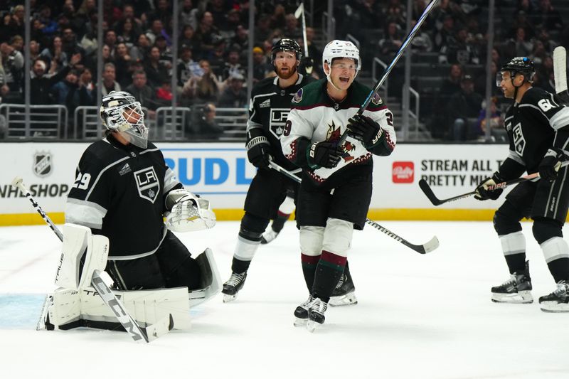 Oct 24, 2023; Los Angeles, California, USA; LA Kings goaltender Pheonix Copley (29) and Arizona Coyotes center Barrett Hayton (29) react in the third period at Crypto.com Arena. Mandatory Credit: Kirby Lee-USA TODAY Sports