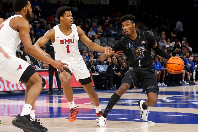 Jan 26, 2023; Memphis, Tennessee, USA; Memphis Tigers guard Keonte Kennedy (1) dribbles as Southern Methodist Mustangs guard Zhuric Phelps (1) defends during the first half at FedExForum. Mandatory Credit: Petre Thomas-USA TODAY Sports