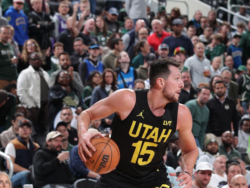 MILWAUKEE, WI - NOVEMBER 7: Drew Eubanks #15 of the Utah Jazz handles the ball during the game against the Milwaukee Bucks on November 7, 2024 at Fiserv Forum Center in Milwaukee, Wisconsin. NOTE TO USER: User expressly acknowledges and agrees that, by downloading and or using this Photograph, user is consenting to the terms and conditions of the Getty Images License Agreement. Mandatory Copyright Notice: Copyright 2024 NBAE (Photo by Gary Dineen/NBAE via Getty Images).