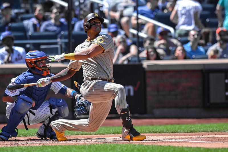 Apr 12, 2023; New York City, New York, USA; San Diego Padres left fielder Juan Soto (22) hits a two-run home run against the New York Mets during the first inning at Citi Field. Mandatory Credit: John Jones-USA TODAY Sports