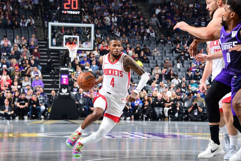 SACRAMENTO, CA - DECEMBER 3: Jalen Green #4 of the Houston Rockets dribbles the ball during the game against the Sacramento Kings during the Emirates NBA Cup game on December 3, 2024 at Golden 1 Center in Sacramento, California. NOTE TO USER: User expressly acknowledges and agrees that, by downloading and or using this Photograph, user is consenting to the terms and conditions of the Getty Images License Agreement. Mandatory Copyright Notice: Copyright 2024 NBAE (Photo by Adam Pantozzi/NBAE via Getty Images)