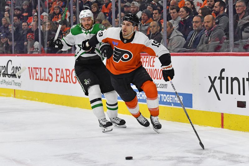 Jan 18, 2024; Philadelphia, Pennsylvania, USA; Philadelphia Flyers right wing Garnet Hathaway (19) Dallas Stars center Matt Duchene (95) battle for the puck during the first period at Wells Fargo Center. Mandatory Credit: Eric Hartline-USA TODAY Sports