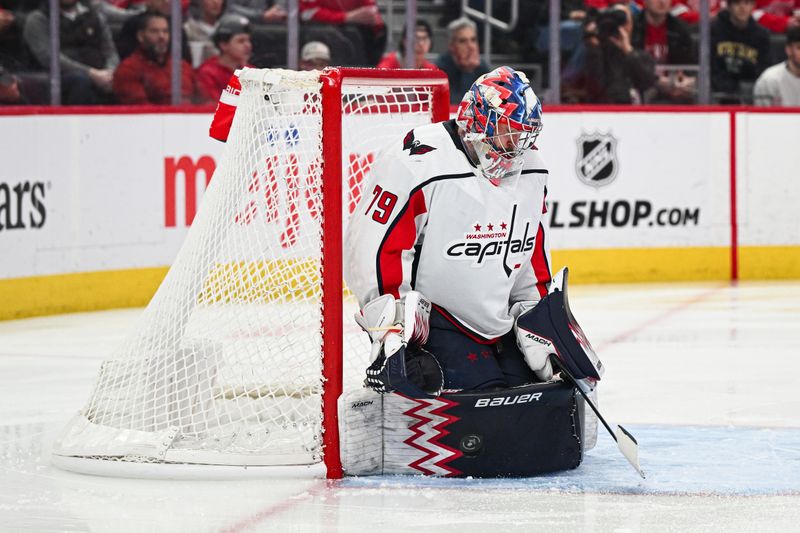 Feb 27, 2024; Detroit, Michigan, USA; Washington Capitals goaltender Charlie Lindgren (79) makes a save during the second period against the Detroit Red Wings at Little Caesars Arena. Mandatory Credit: Tim Fuller-USA TODAY Sports