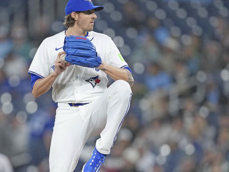 Apr 17, 2024; Toronto, Ontario, CAN; Toronto Blue Jays starting pitcher Kevin Gausman (34) throws a pitch against the New York Yankees during the first inning at Rogers Centre. Mandatory Credit: Nick Turchiaro-USA TODAY Sports