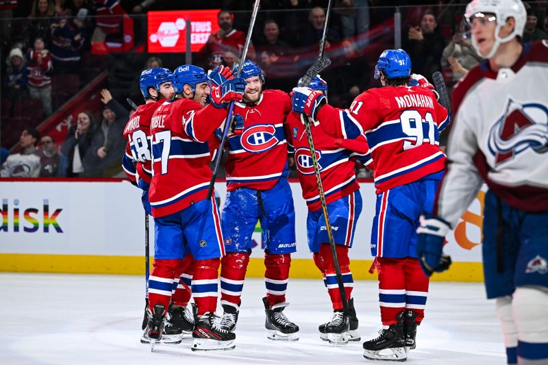 Jan 15, 2024; Montreal, Quebec, CAN; Montreal Canadiens right wing Joel Armia (40) celebrates his goal against the Colorado Avalanche with his teammates during the third period at Bell Centre. Mandatory Credit: David Kirouac-USA TODAY Sports