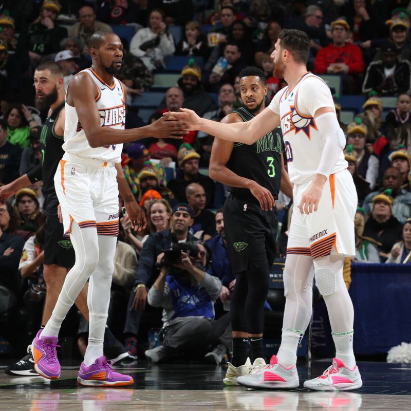 NEW ORLEANS, LA - JANUARY 19: Kevin Durant #35 of the Phoenix Suns high fives Jusuf Nurkic #20 of the Phoenix Suns during the game against the New Orleans Pelicans on January 19, 2024 at the Smoothie King Center in New Orleans, Louisiana. NOTE TO USER: User expressly acknowledges and agrees that, by downloading and or using this Photograph, user is consenting to the terms and conditions of the Getty Images License Agreement. Mandatory Copyright Notice: Copyright 2024 NBAE (Photo by Layne Murdoch Jr./NBAE via Getty Images)