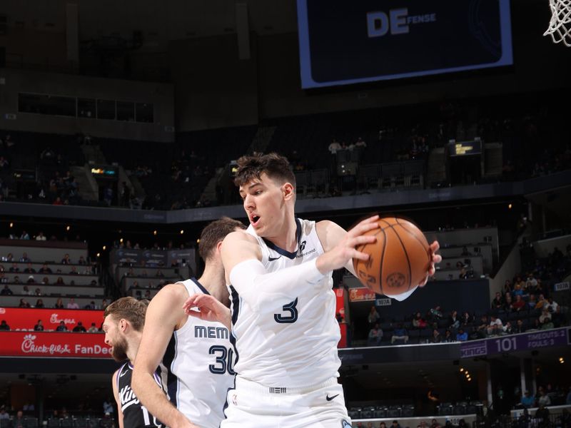 MEMPHIS, TN - DECEMBER 5: Jake LaRavia #3 of the Memphis Grizzlies rebounds the ball during the game against the Sacramento Kings on December 5, 2024 at FedExForum in Memphis, Tennessee. NOTE TO USER: User expressly acknowledges and agrees that, by downloading and or using this photograph, User is consenting to the terms and conditions of the Getty Images License Agreement. Mandatory Copyright Notice: Copyright 2024 NBAE (Photo by Joe Murphy/NBAE via Getty Images)