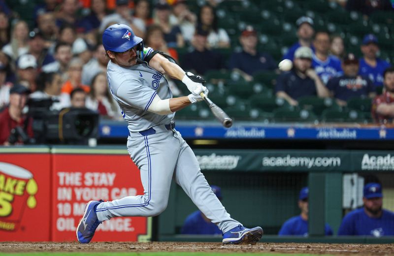Apr 2, 2024; Houston, Texas, USA; Toronto Blue Jays left fielder Davis Schneider (36) hits a two-run home run during the ninth inning against the Houston Astros at Minute Maid Park. Mandatory Credit: Troy Taormina-USA TODAY Sports