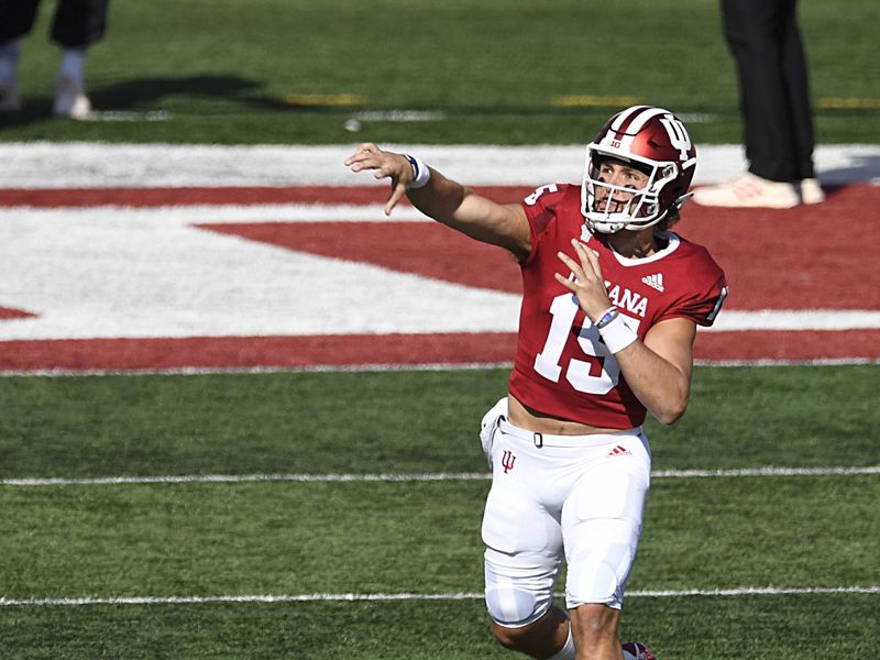 Oct 24, 2020; Bloomington, Indiana, USA; Indiana Hoosiers quarterback Zack Merrill (15) warms up before the game against the Penn State Nittany Lions. Mandatory Credit: Marc Lebryk-USA TODAY Sports