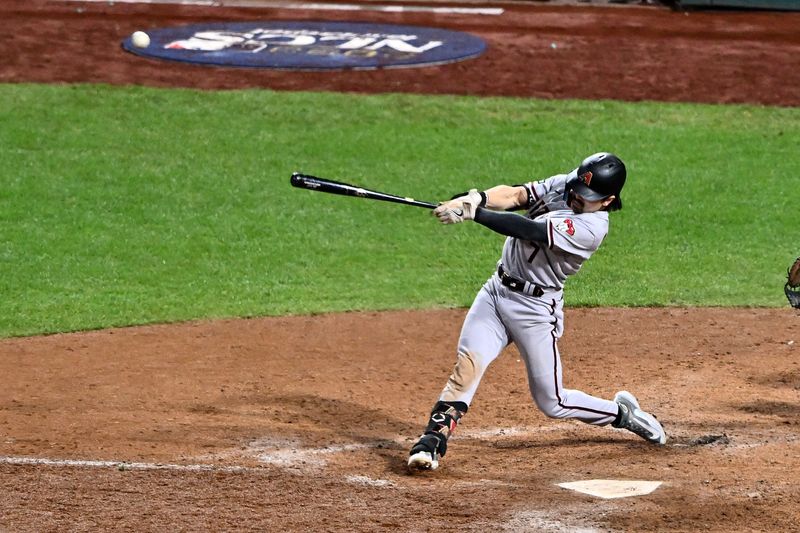 Oct 24, 2023; Philadelphia, Pennsylvania, USA; Arizona Diamondbacks left fielder Corbin Carroll (7) hits a RBI sacrifice fly ball against the Philadelphia Phillies in the seventh inning during game seven of the NLCS for the 2023 MLB playoffs at Citizens Bank Park. Mandatory Credit: Kyle Ross-USA TODAY Sports