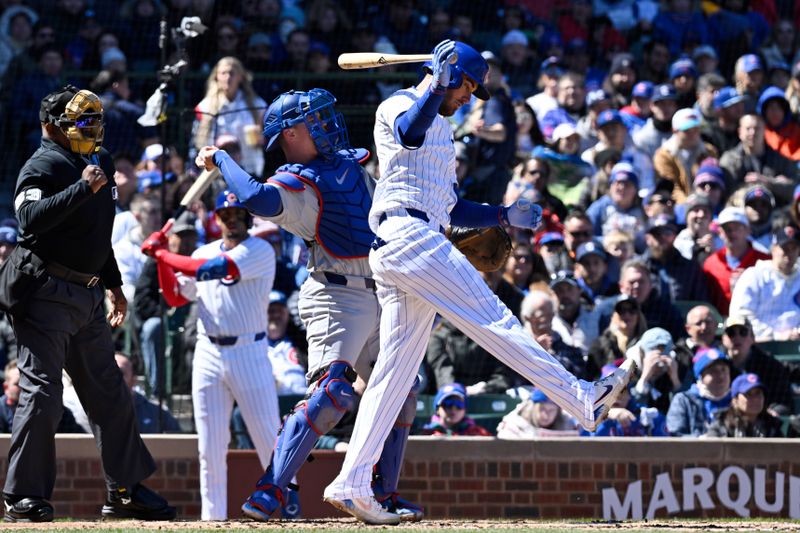 Apr 5, 2024; Chicago, Illinois, USA;  Chicago Cubs outfielder Cody Bellinger (24) reacts after striking out during the first inning against the Los Angeles Dodgers at Wrigley Field. Mandatory Credit: Matt Marton-USA TODAY Sports