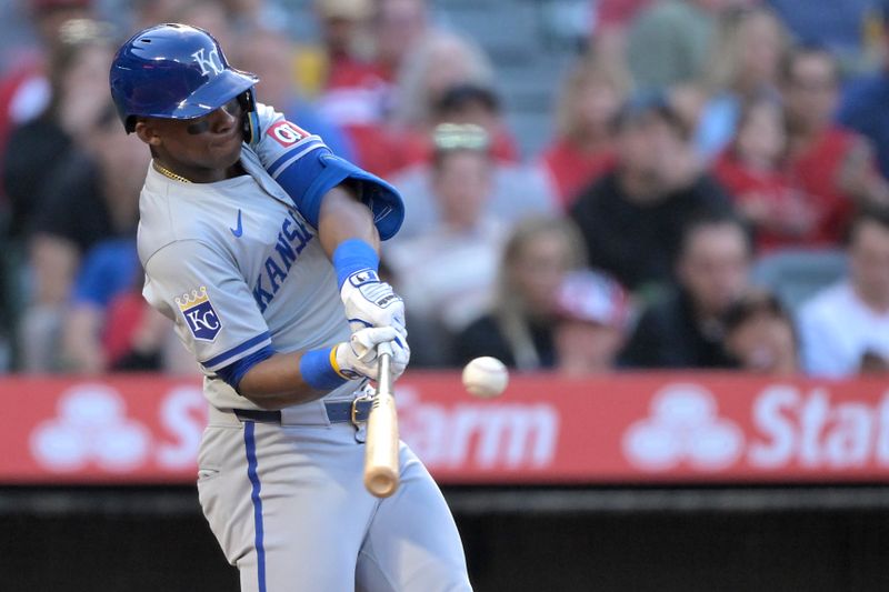 May 9, 2024; Anaheim, California, USA;  Kansas City Royals outfielder Dairon Blanco (44) hits a two-run home run off Los Angeles Angels pitcher Reid Detmers (48) in the third inning at Angel Stadium. Mandatory Credit: Jayne Kamin-Oncea-USA TODAY Sports