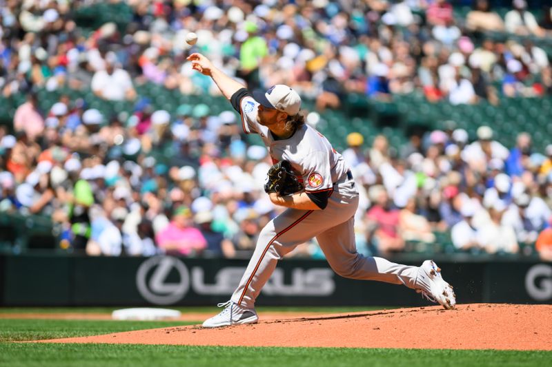 Jul 4, 2024; Seattle, Washington, USA; Baltimore Orioles starting pitcher Corbin Burnes (39) pitches to the Seattle Mariners during the first inning at T-Mobile Park. Mandatory Credit: Steven Bisig-USA TODAY Sports