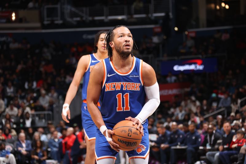 WASHINGTON, DC -? OCTOBER 18: Jalen Brunson #11 of the New York Knicks shoots a free throw during the game against the Washington Wizards on October 18, 2024 at Capital One Arena in Washington, DC. NOTE TO USER: User expressly acknowledges and agrees that, by downloading and or using this Photograph, user is consenting to the terms and conditions of the Getty Images License Agreement. Mandatory Copyright Notice: Copyright 2024 NBAE (Photo by Kenny Giarla/NBAE via Getty Images)